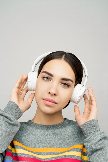 Person listening with headphones